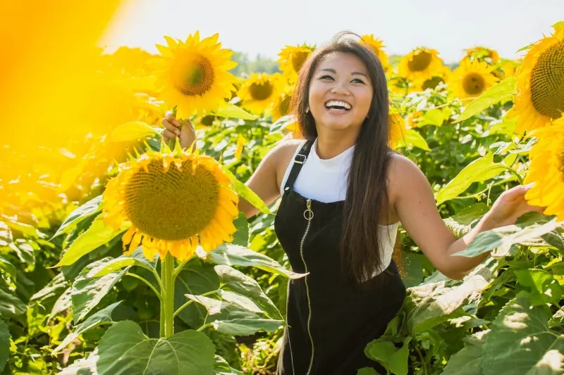 Women amongst sunflowers